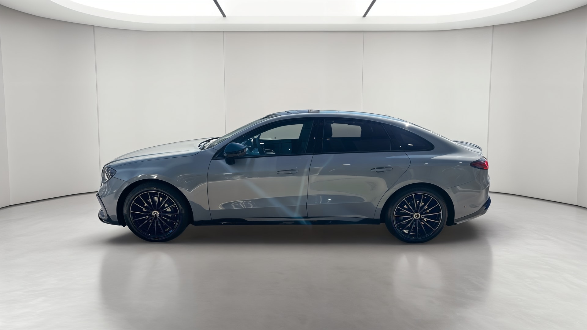 Mercedes-Benz Classe C 400 Electrique 4M AMG Line — Profil gauche